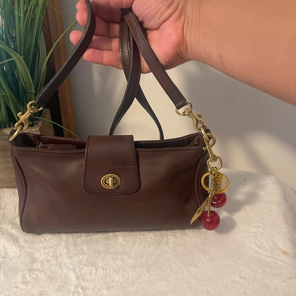Coach Handbags - Coach Dark Brown Crossbody Bag with Gold and Red Accents